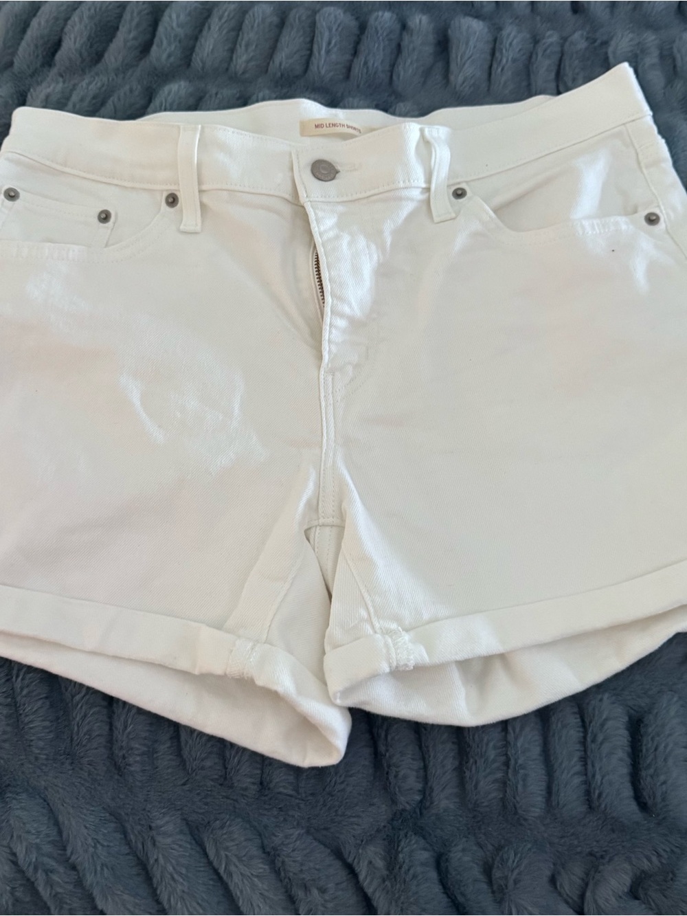 Levis Strauss & Co. Mid-Rise White Denim Jean Shorts with Rolled Hem